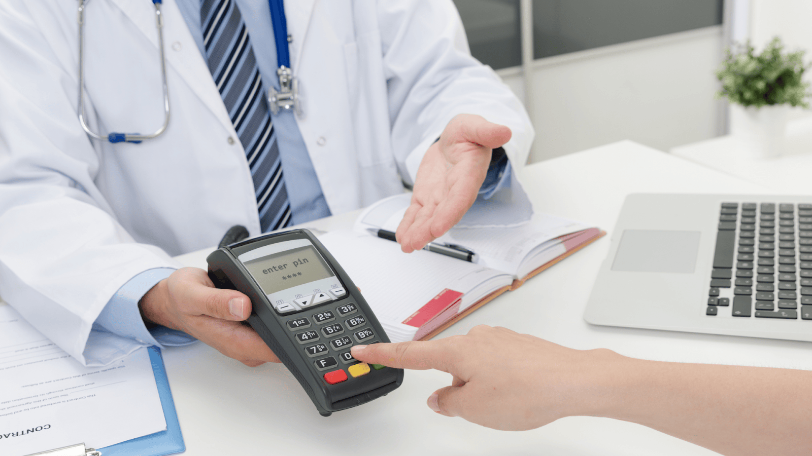 image of patient paying for cancer insurance