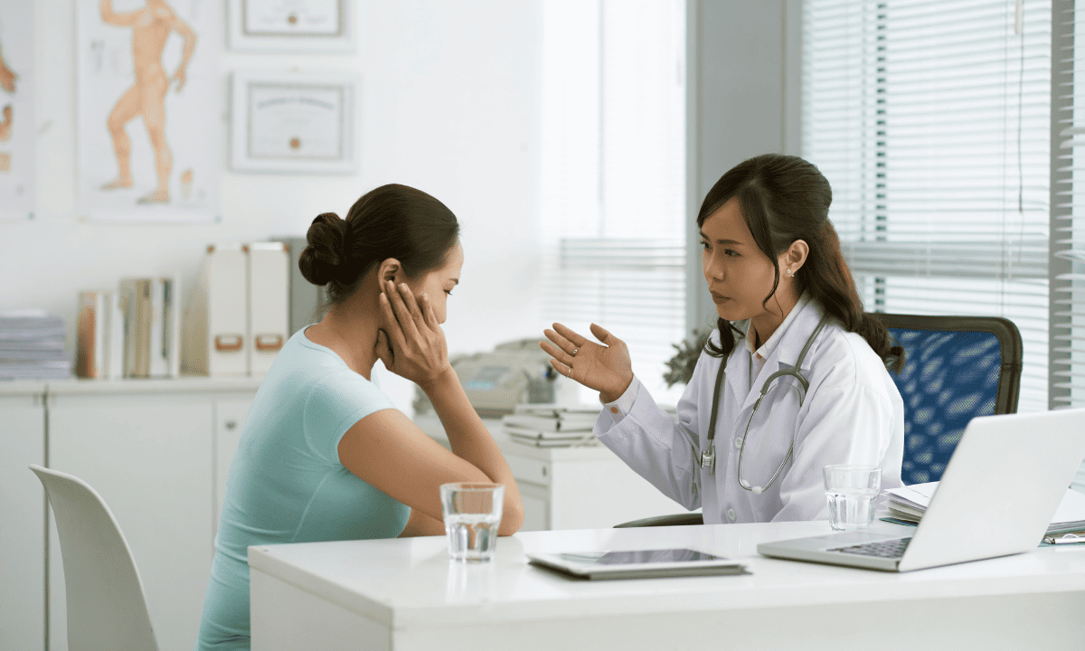 image of woman consulting with a female doctor
