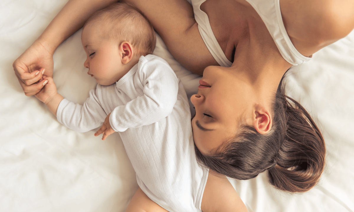 image of sleeping mother and baby
