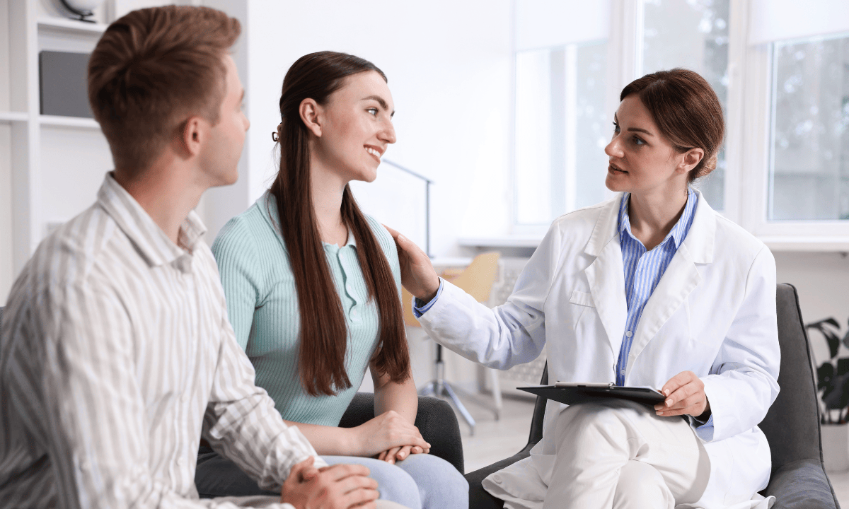 Couple consulting with a fertility doctor