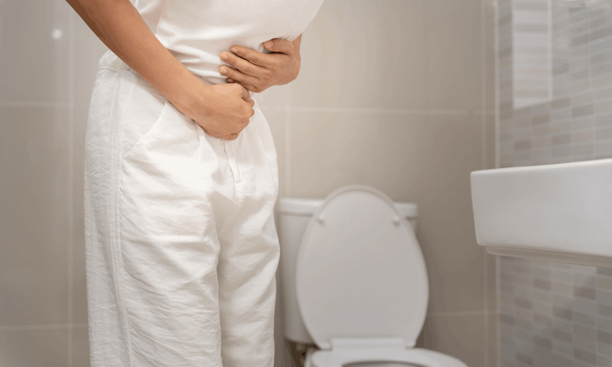 Illustration of a woman having constipation after IVF transfer