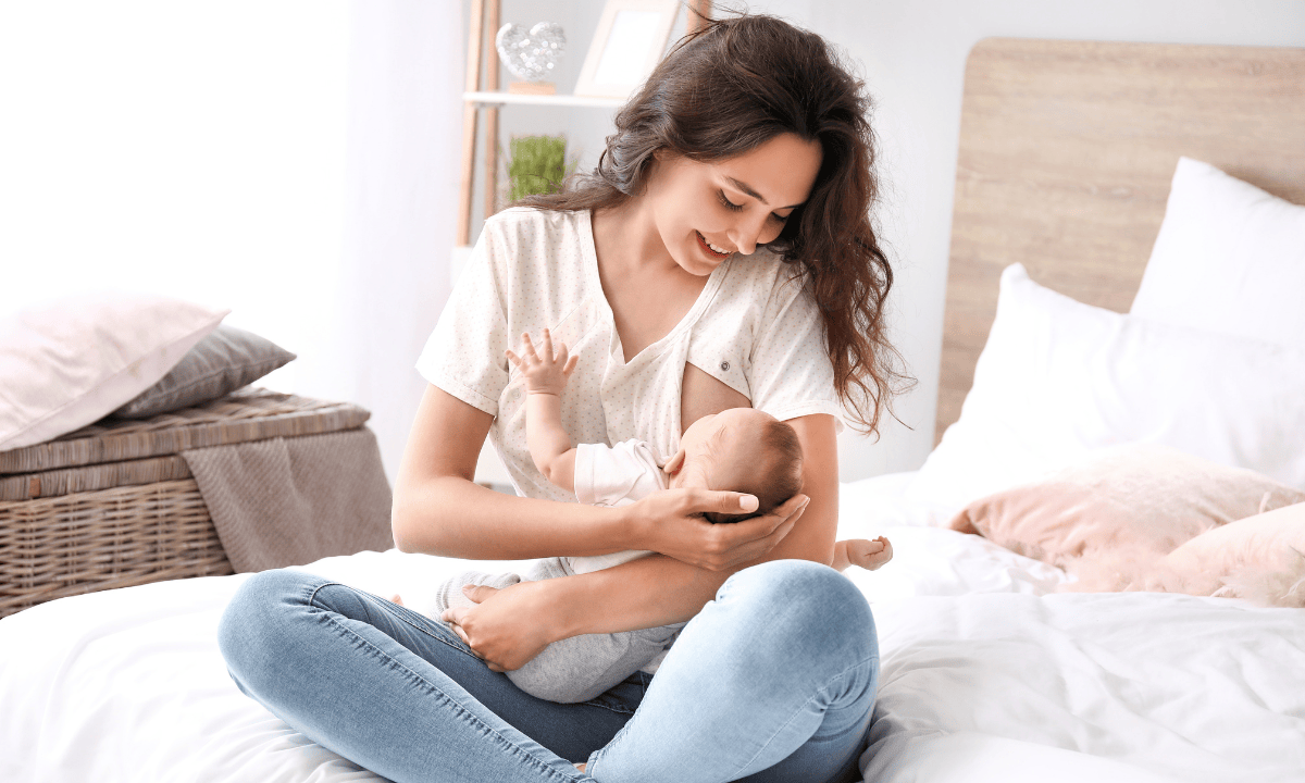 woman breastfeeding a baby