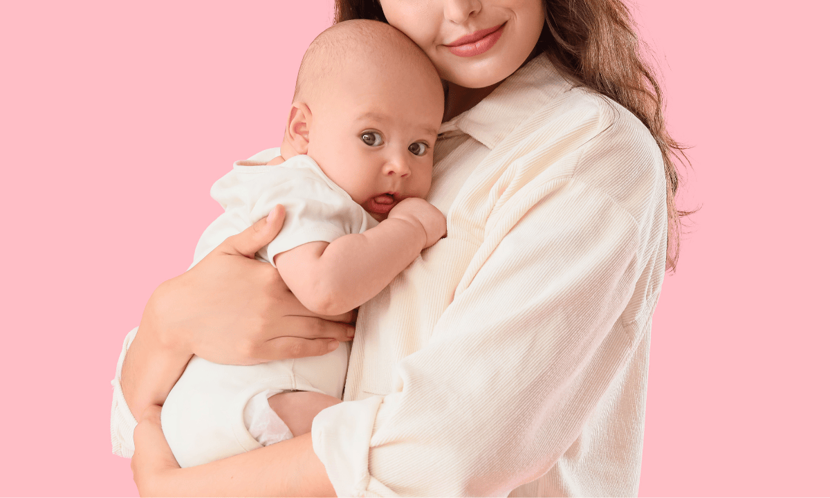 A woman holding a baby