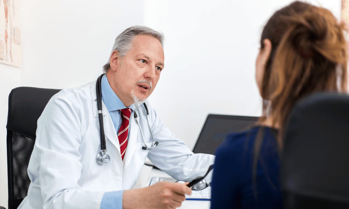 image of a doctor consulting a patient