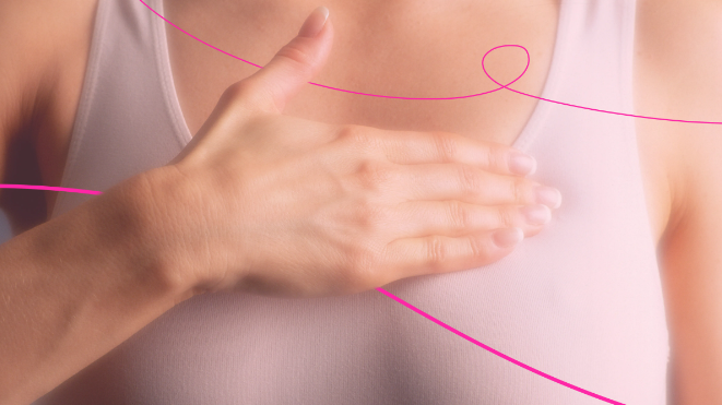 woman doing breast check for breast cancer detection