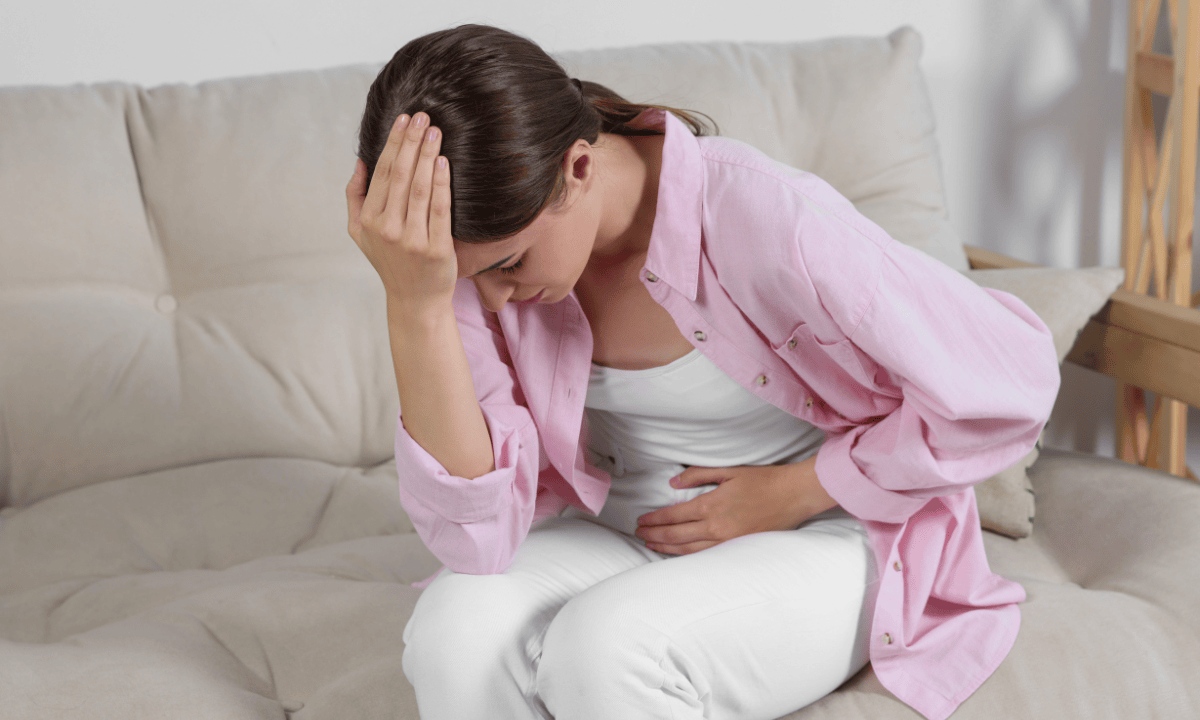 image of women experincing genital pain due to UTI