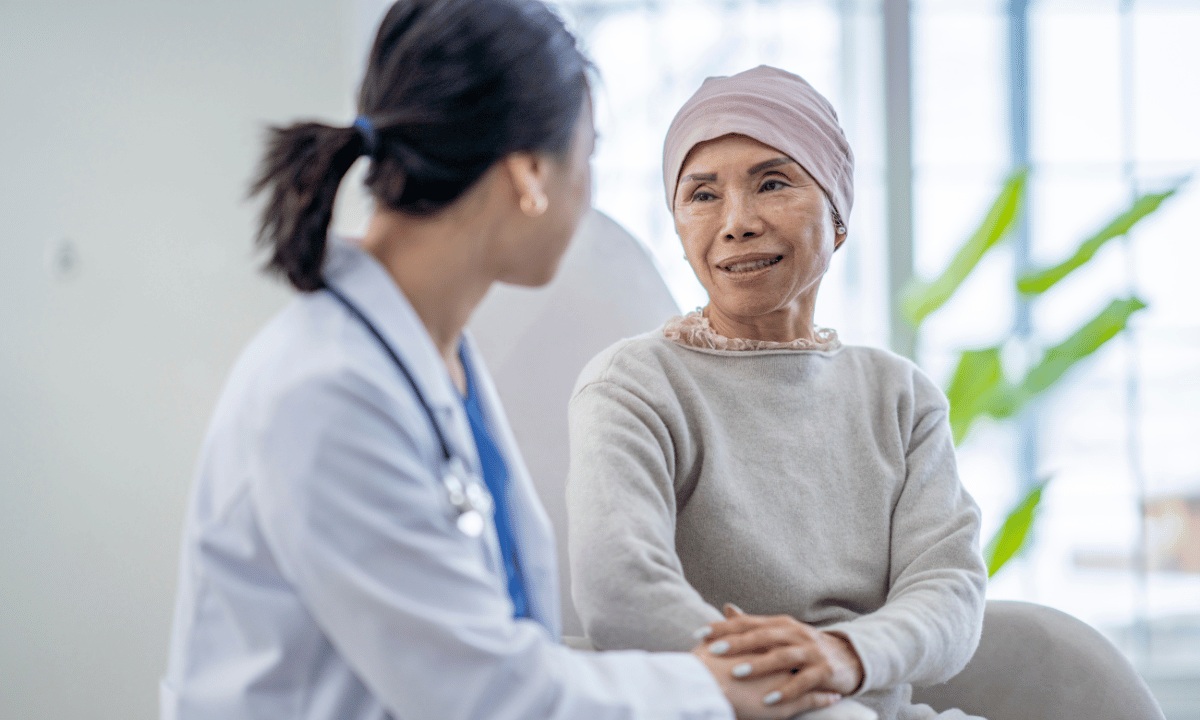 image of older female patient consulting with doctor