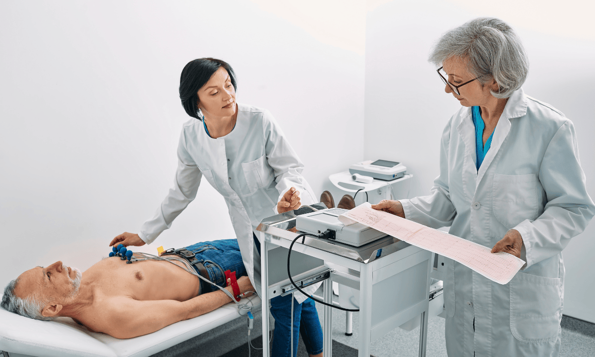 blog-image_screening_doctor-performing-ecg-test.png