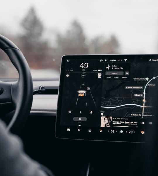 Close-up image of a vehicle's center console touchscreen.