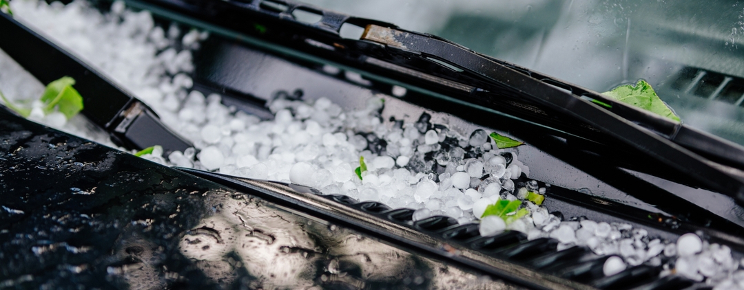 Small pellets of hail on windshield