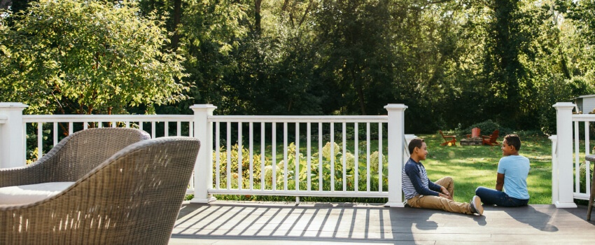 Boys sitting on a porch