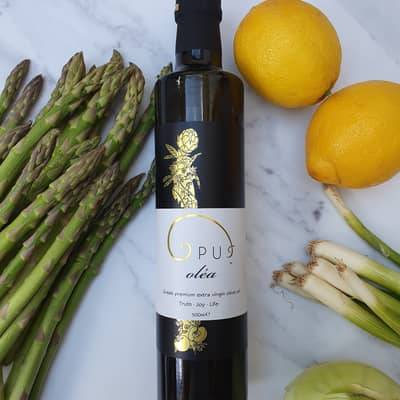 Extra virgin olive oil bottle and Spring veggies