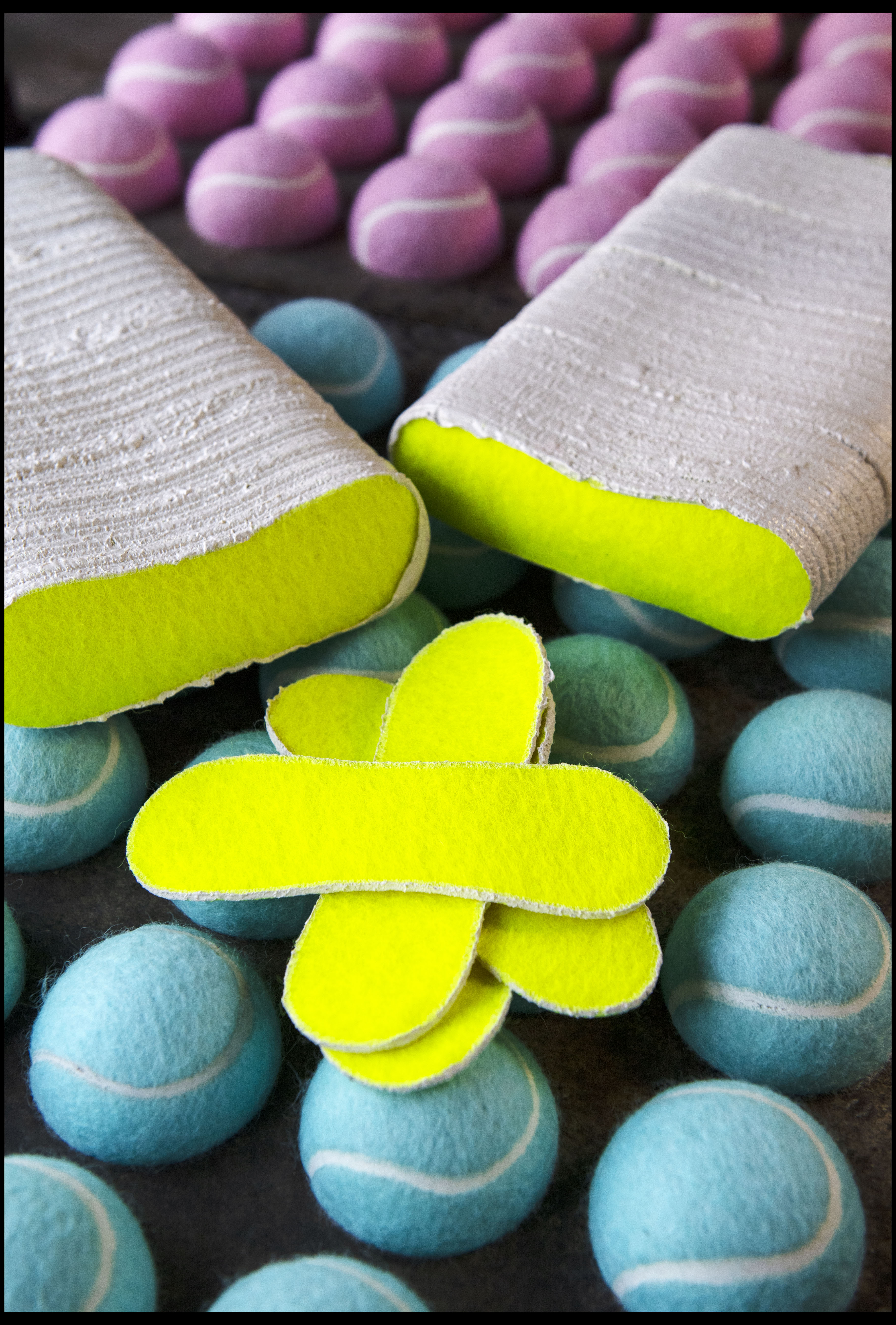 Cloth figure of eights to cover tennis balls