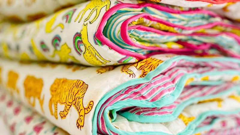 block print mini quilts in animal prints. Kids bedding from Bombaby