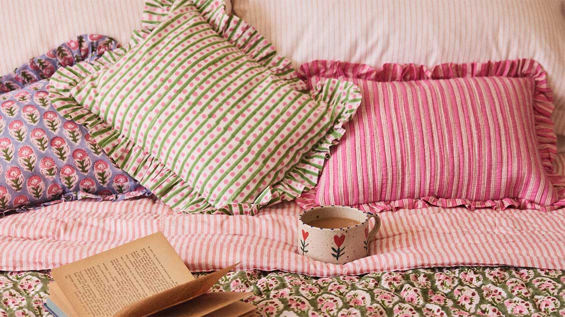stripey frilly cushion