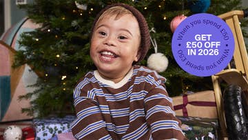 boy with christmas presents hero banner