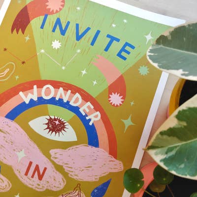 A close up of Lucy Scott's print titled 'Invite Wonder In'