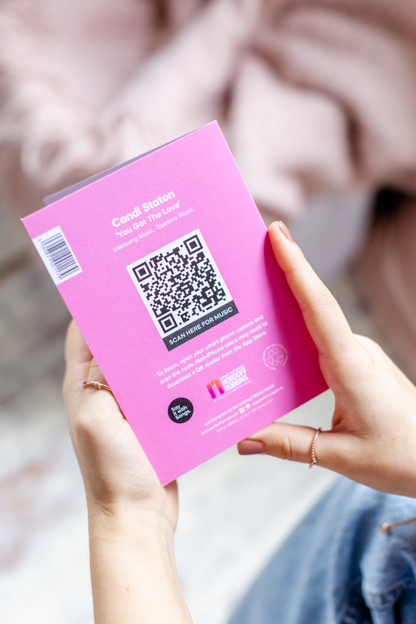 On the reverse find a code that when scanned by a smartphone allows the full song to be streamed instantly! Compatible with You Tube, Spotify or Amazon Music 