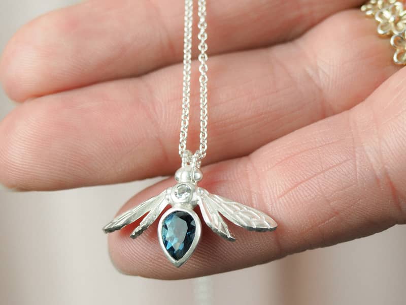gemstone bee necklace with london blue topaz