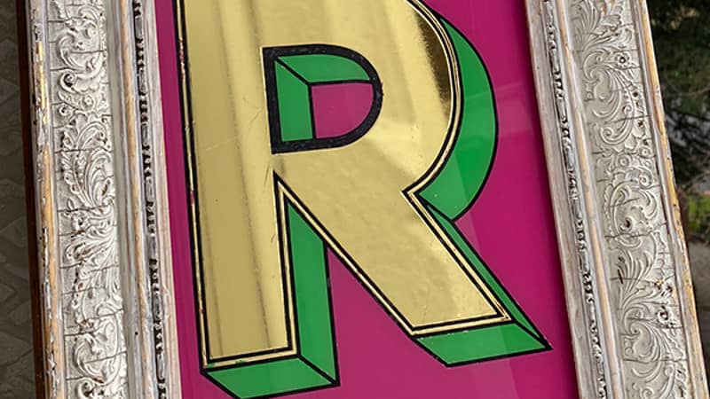 Hand made gold gilded 'R' on glass