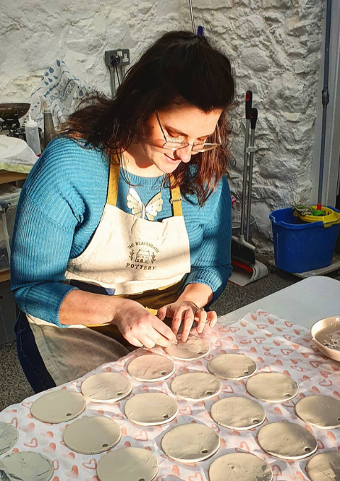 potter making decorations