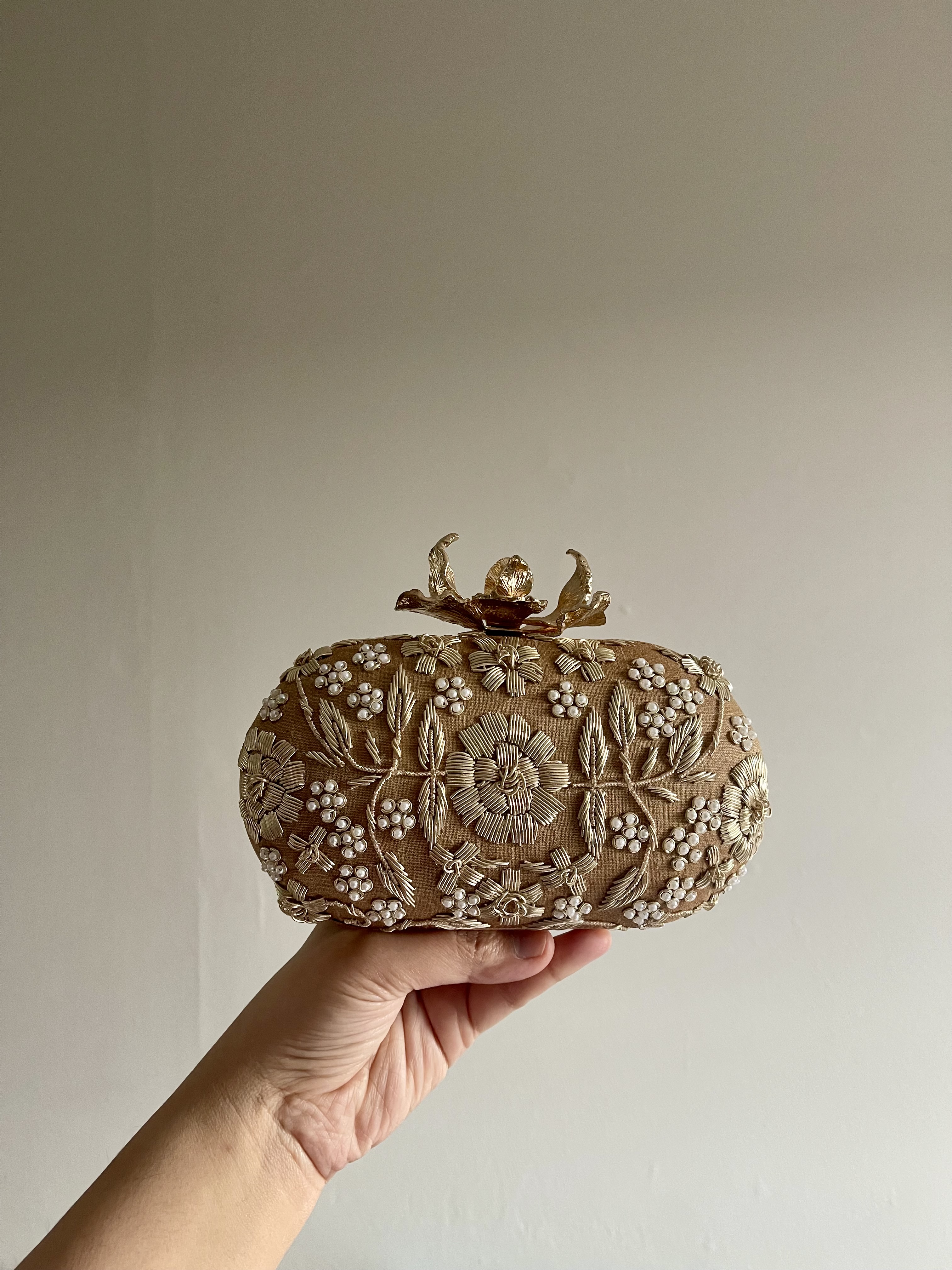 Gold Oval Embroidered Clutch