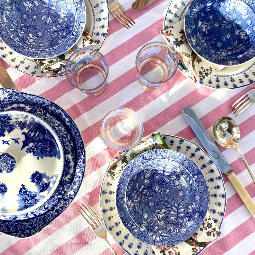 Pink and white striped tablecloth