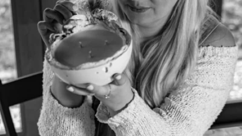 Artist working on concrete candle bowl