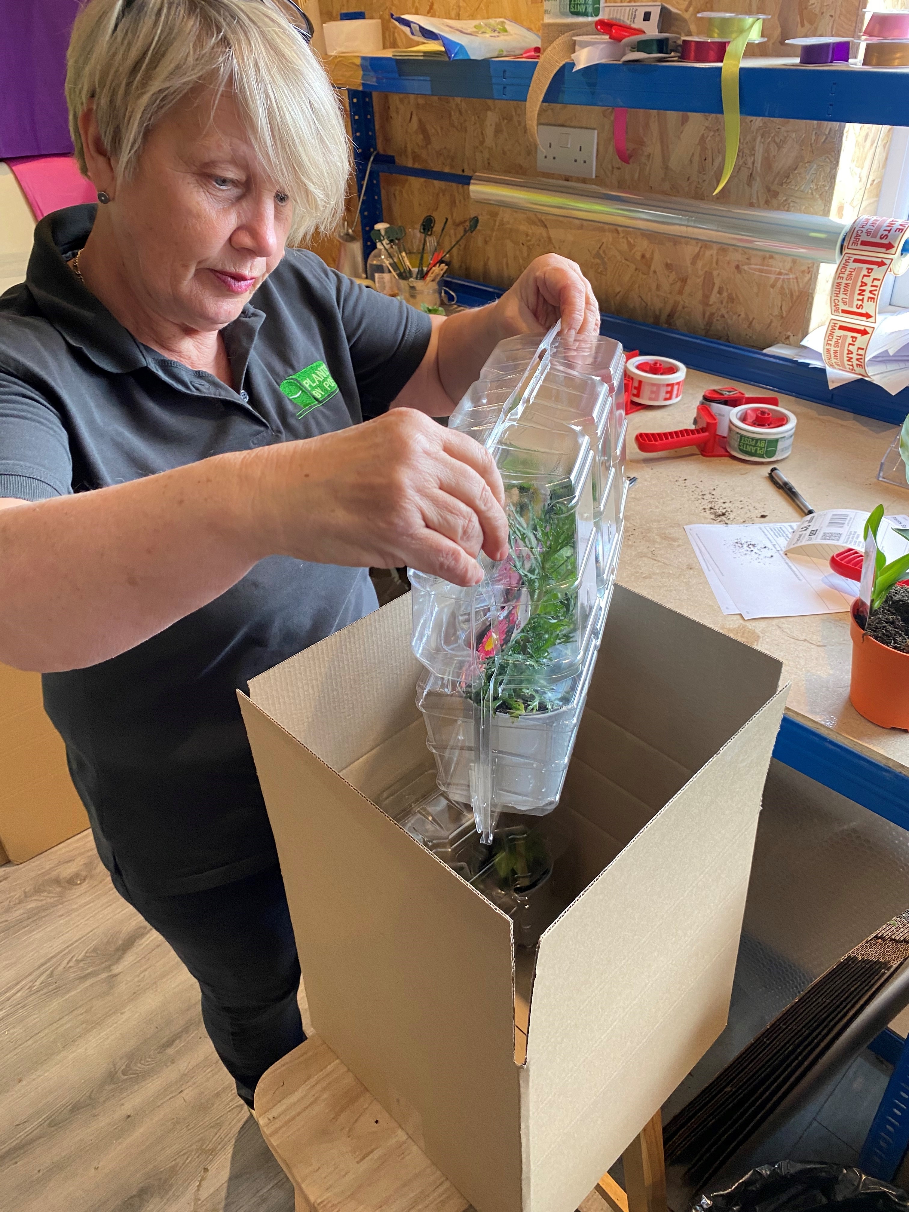 Member of the dispatch team packing