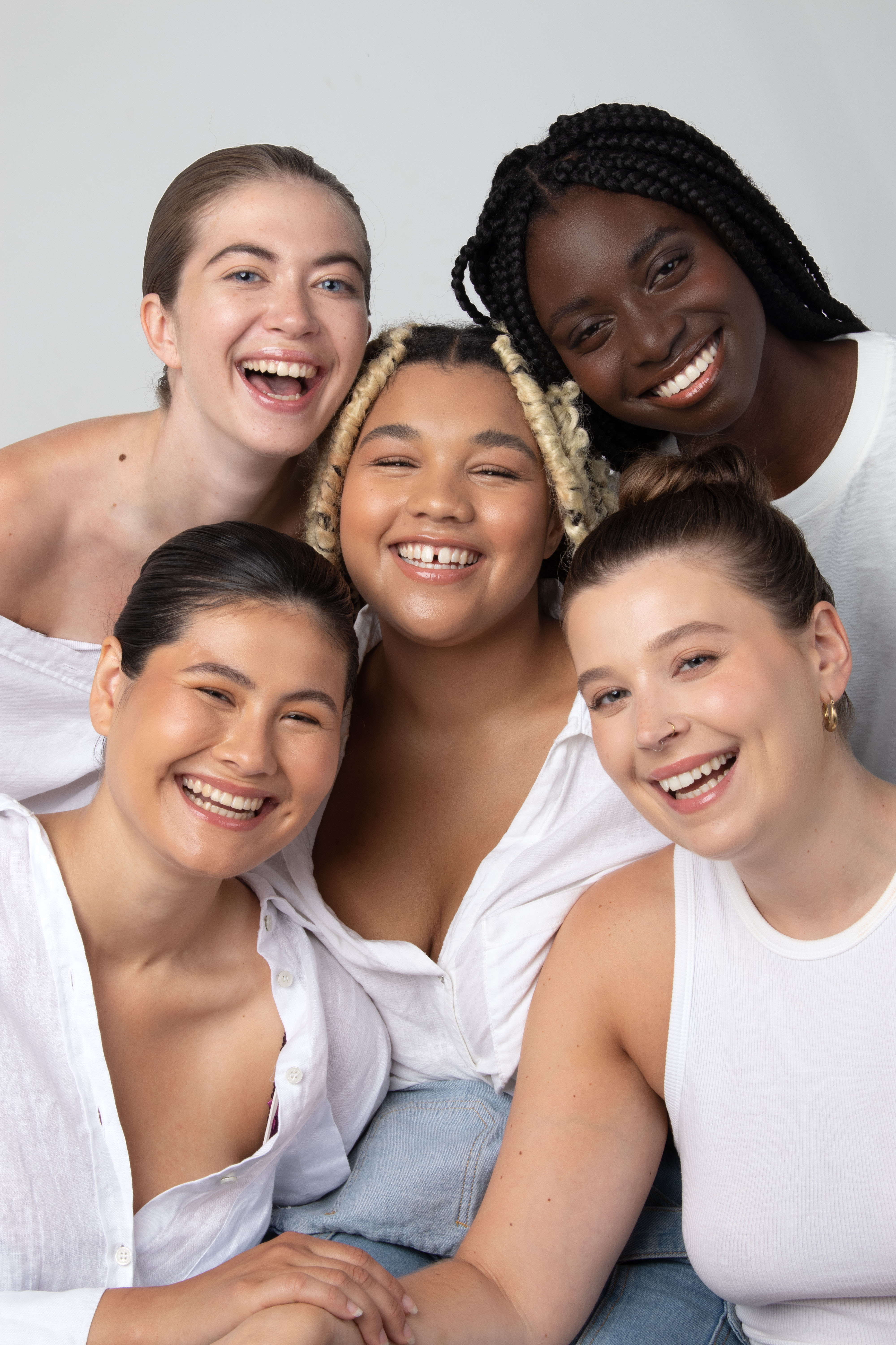 5 girls laughing naturally
