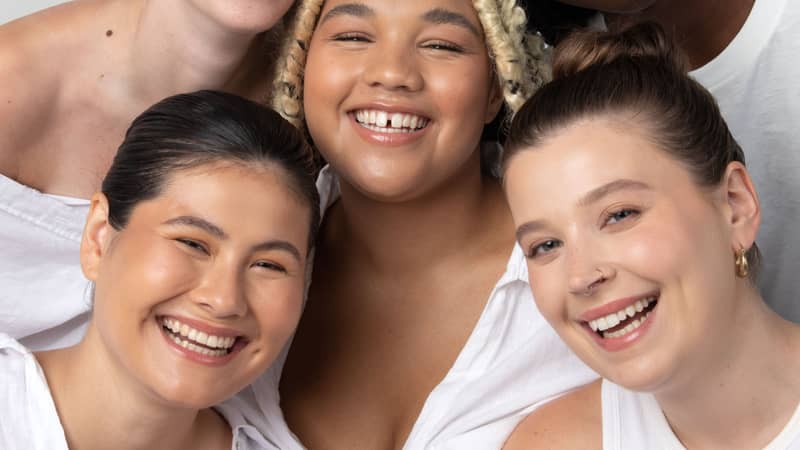 5 girls laughing naturally