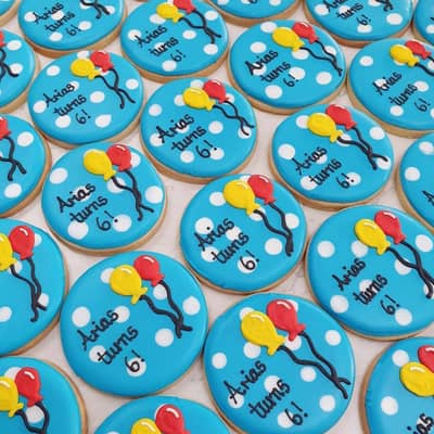 Colourful personalised polka dot birthday biscuits