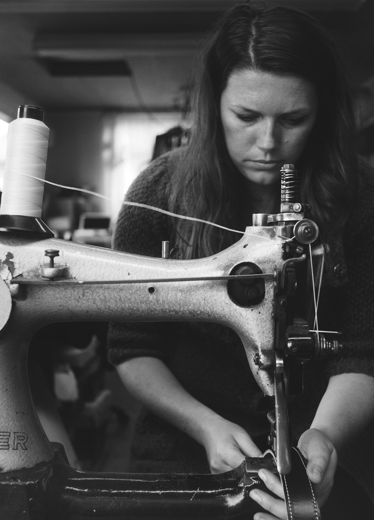 At the sewing machine