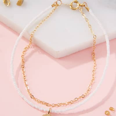 Long silver necklace with triangle pendant