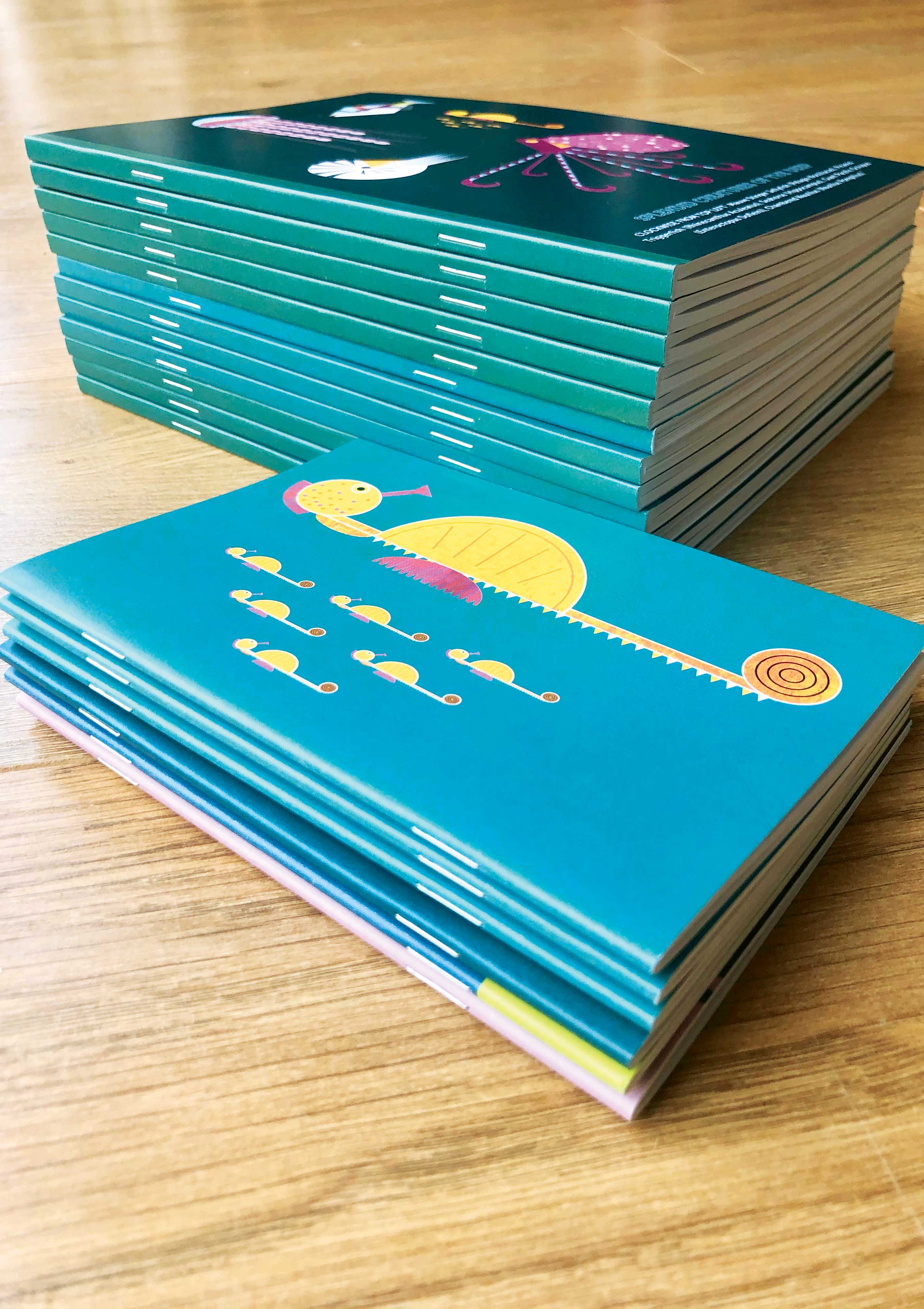 Stacked Seahorse notebooks designed by Ellie Good Illustration