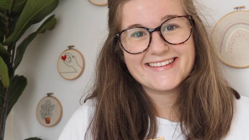 Thimble and fabric small business founder portrait Jess