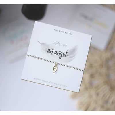 blonde lady holding a Sausage Dog