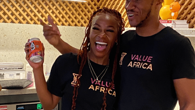 Founder of Value Africa laughing while serving Africa's best