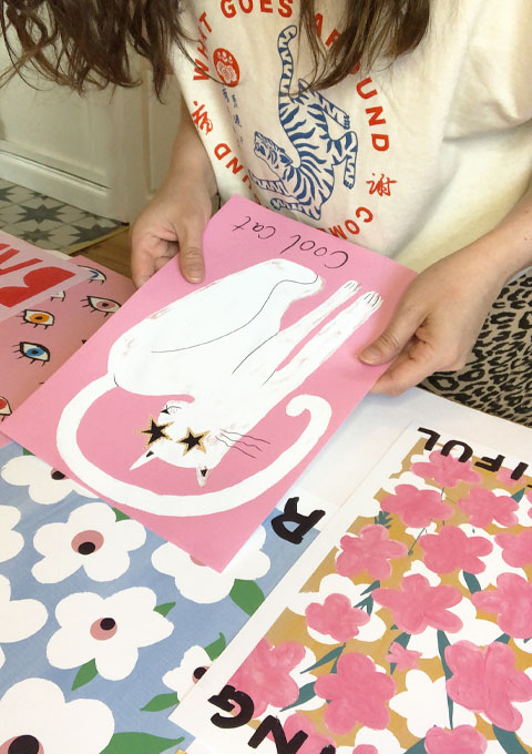 Keren printing artwork in her studio