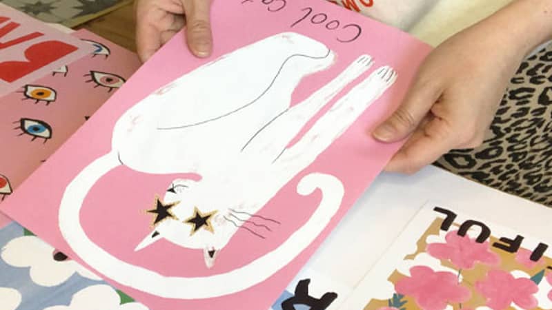 Keren printing artwork in her studio