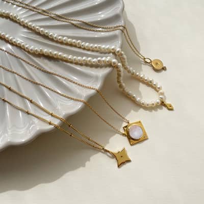 Flat Lay of Eliza Asta Jewellery in trinket dish.