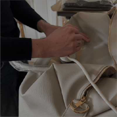 personalisation process of a soft grey weekender bag