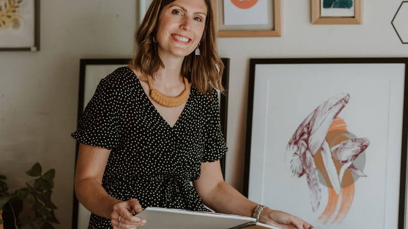 Image of Kirsty Hall with her art work.