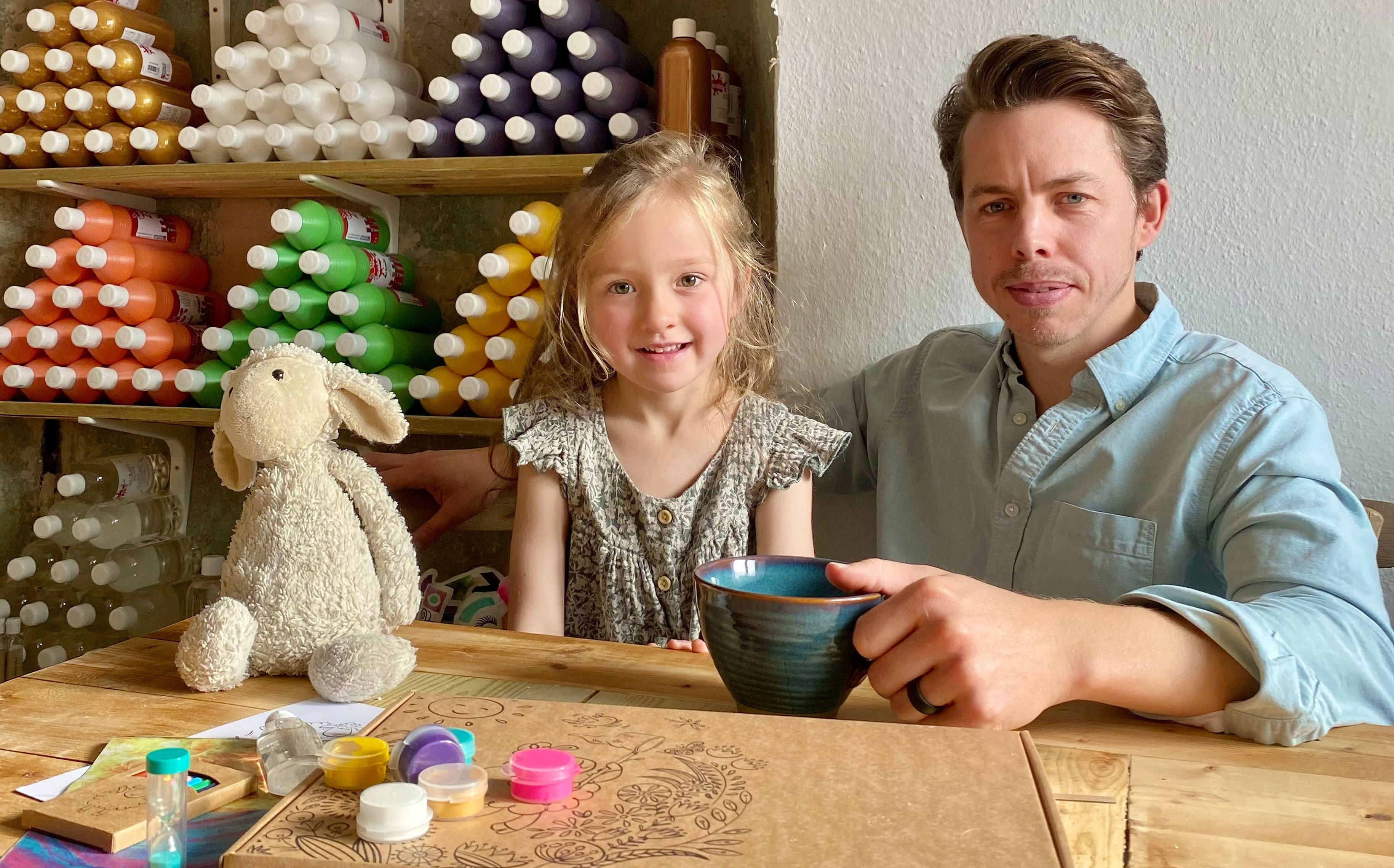Founder, Ben, with daughter Evie and 'Ewe' in the workshop.