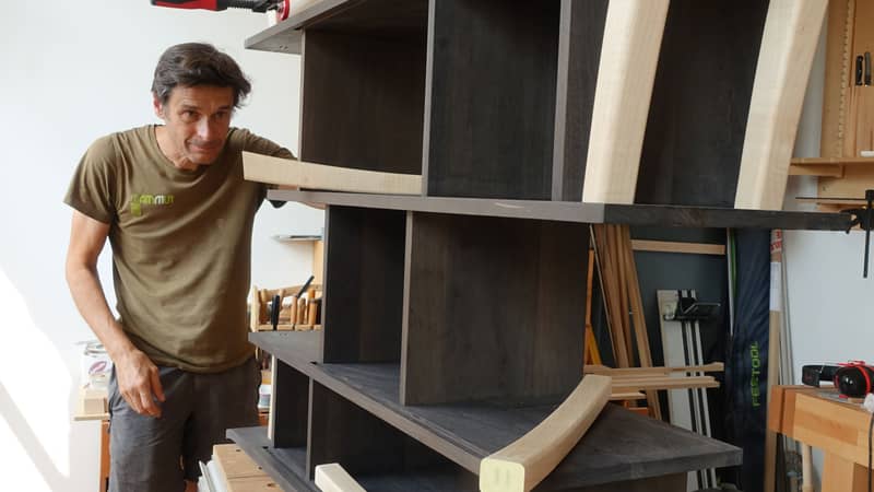 Roland assembling a cabinet.