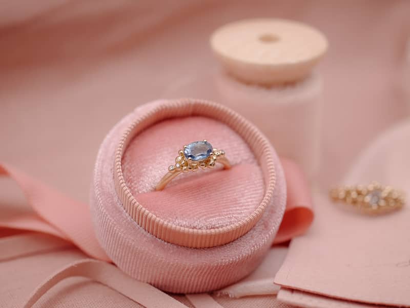 Granulated recycled gold and sapphire ring.