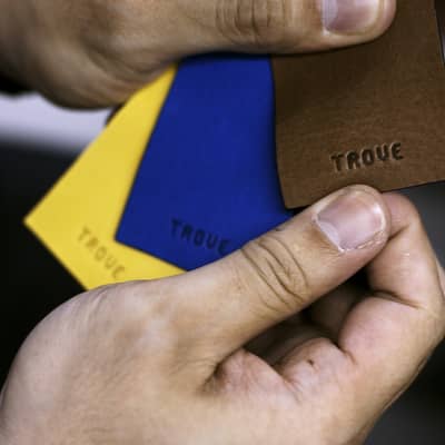 inspecting leather pieces