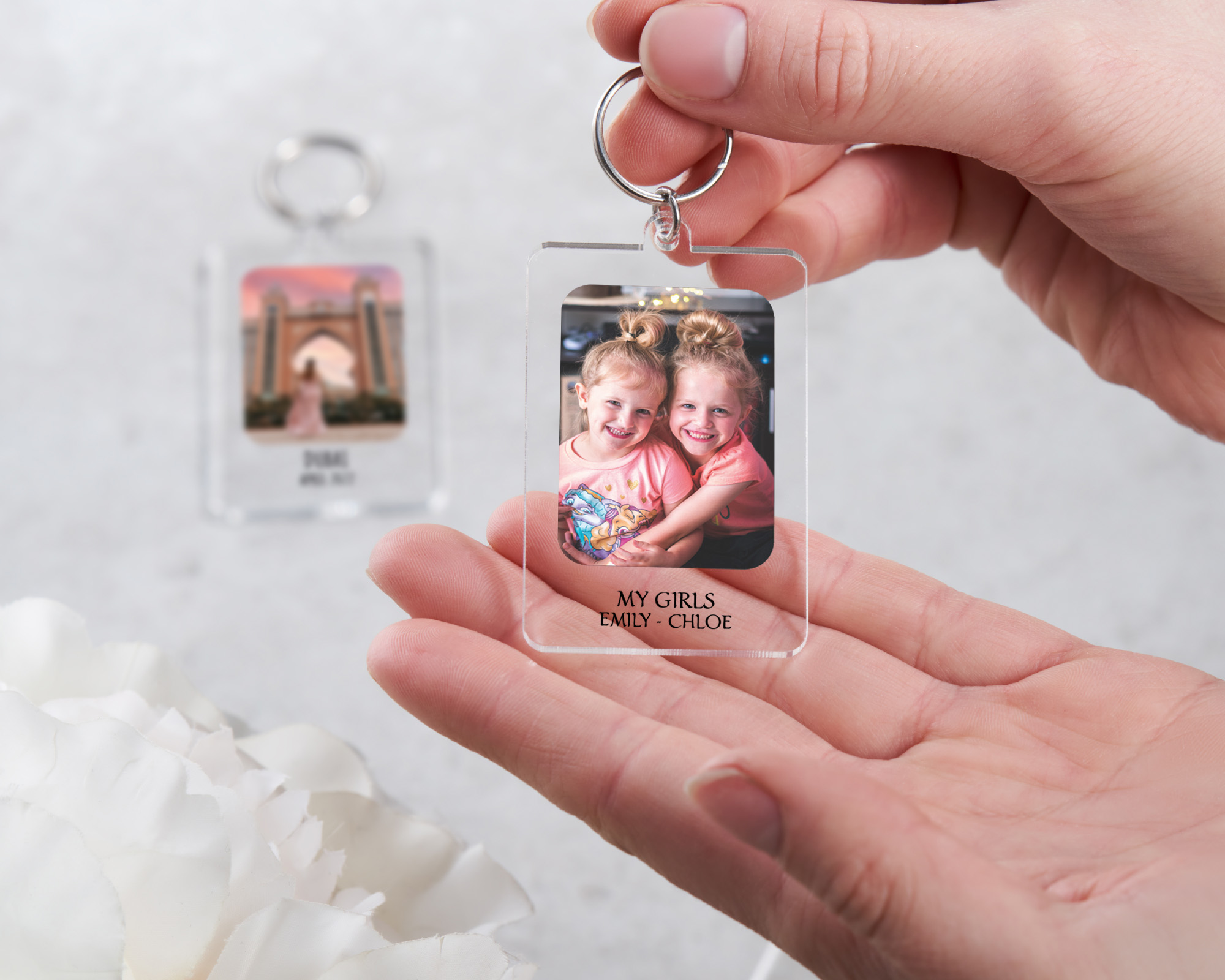 Personalised photo prints on keyrings.