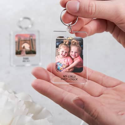 Personalised photo prints on keyrings.