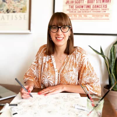 Jo drawing on her kitchen table!